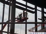 Continued welding the remaining tube steels at the top of the main steel column Facing South(800x600).jpg